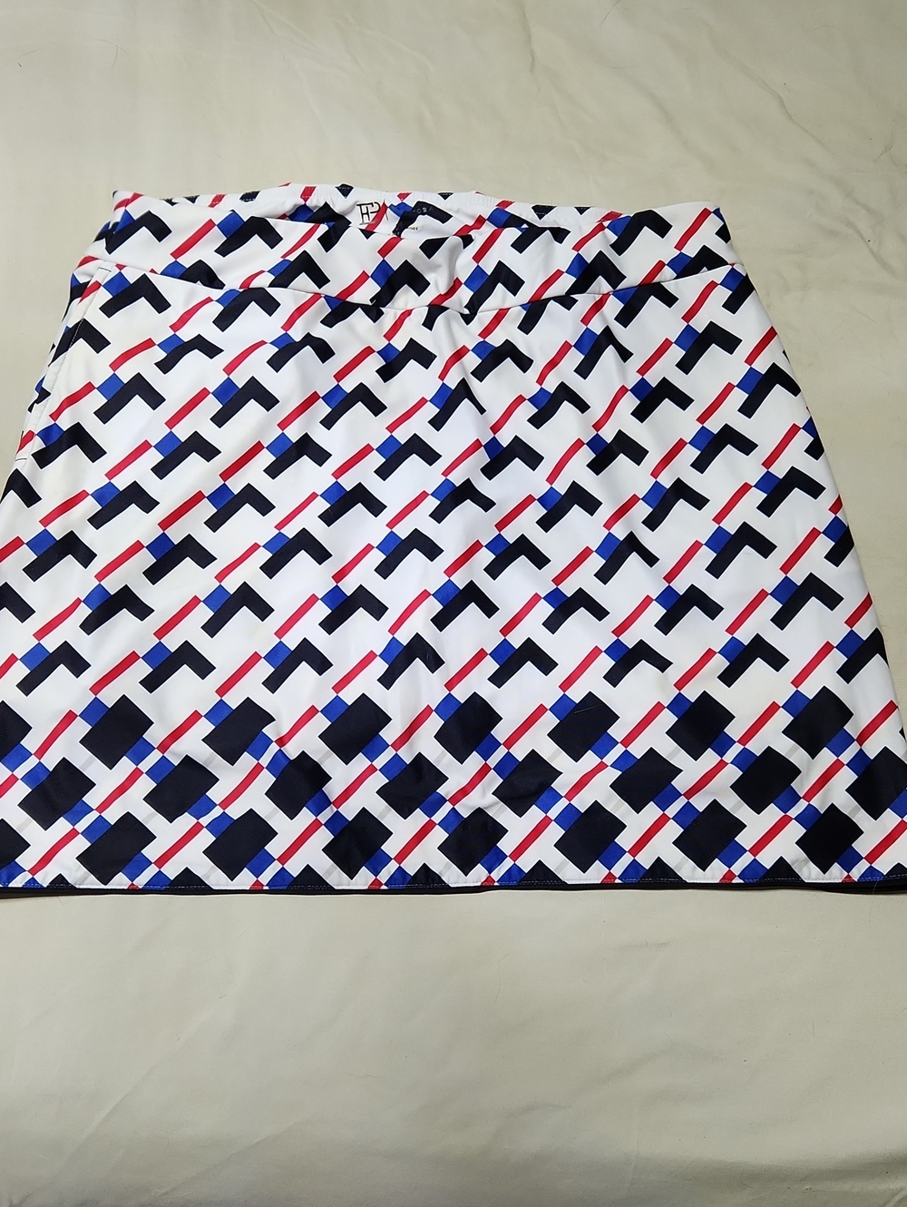 EP Pro White Mini Skirt with Navy, Red & Royal Blue Geometric Design
